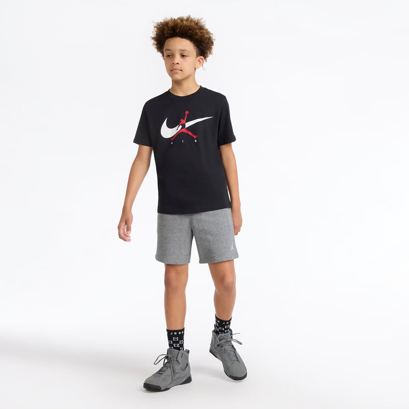 Black youth T-shirt with white swoosh and red Jumpman graphic