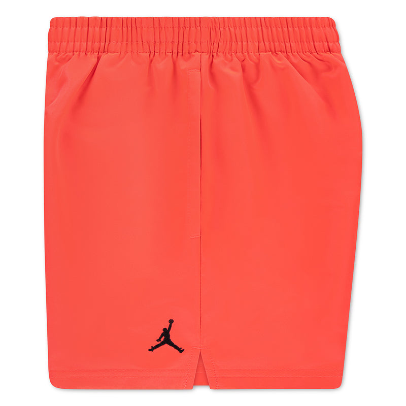 Coral red kids play shorts with elastic waistband and Jumpman logo