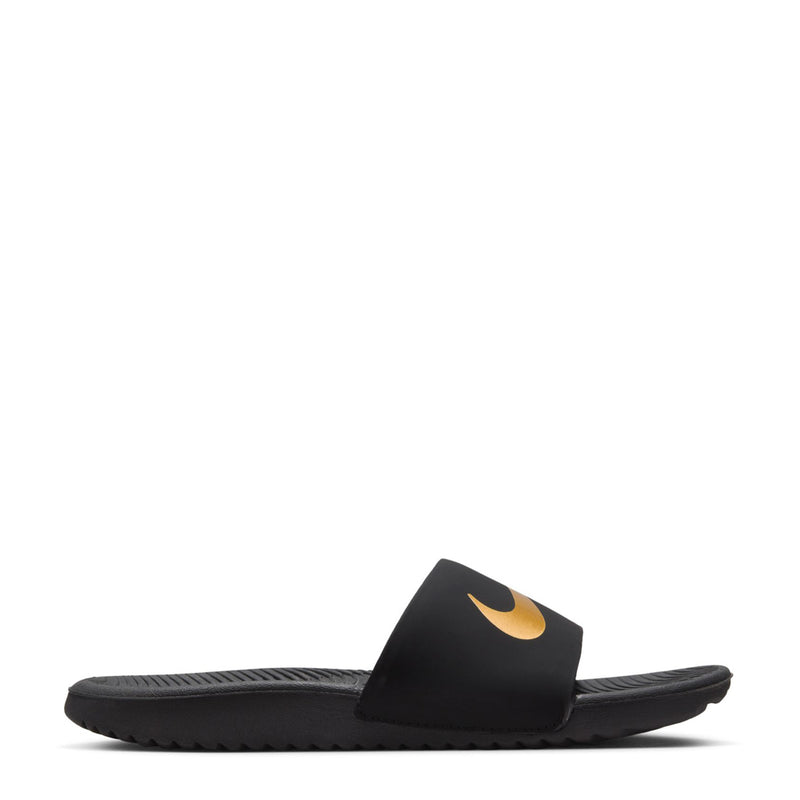 Youth black slide sandals with Nike gold swoosh on wide strap