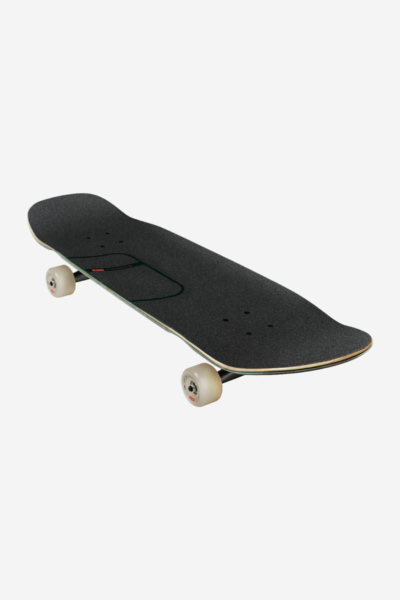 Kerbo Cruiserboard 32 inch in black maple with emerald green trim, top view showing grip tape and trucks.