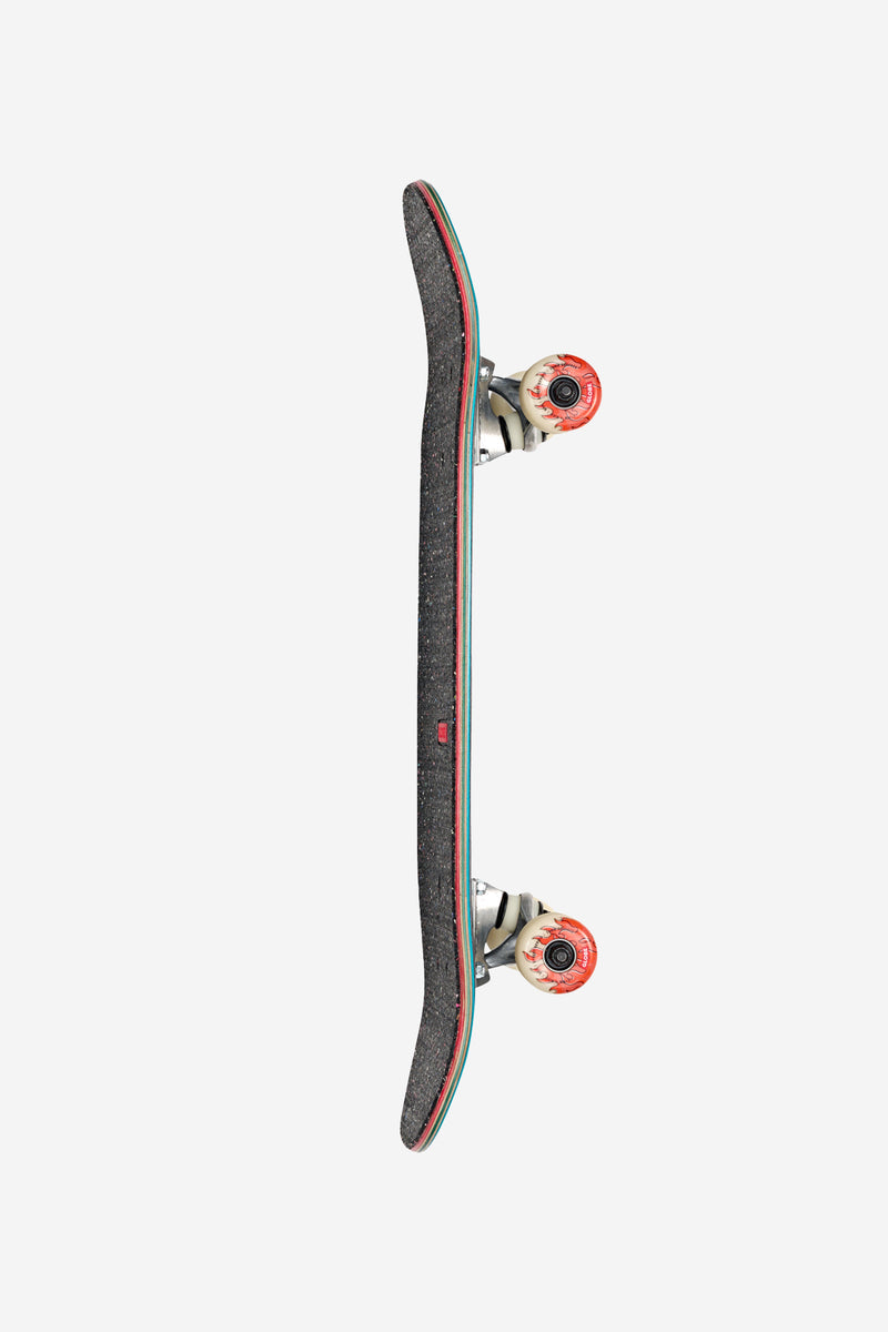 Side profile of black glitter skateboard with teal edging and red wheels