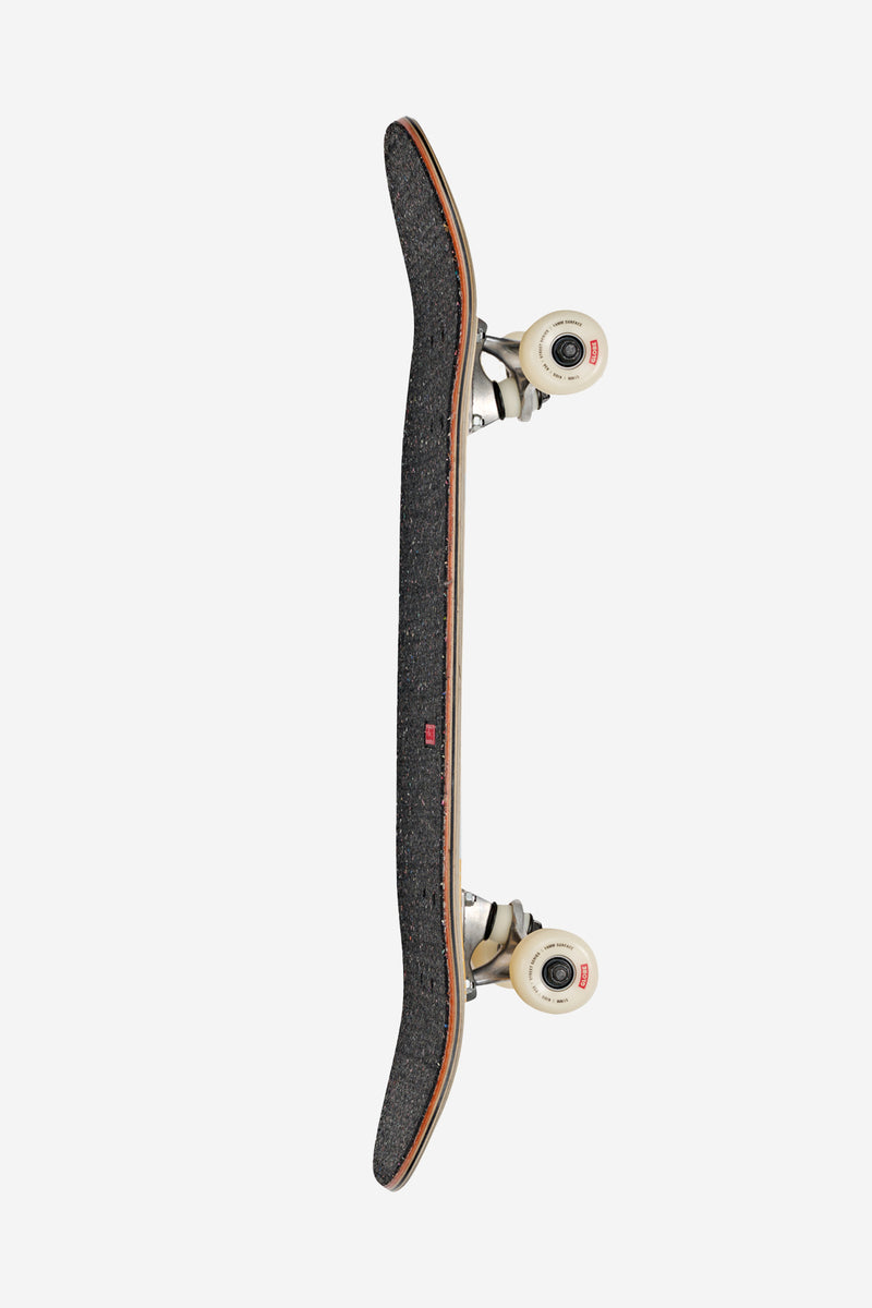 Side view of the Kids Softie Mini complete skateboard showing silver trucks and cream wheels on a speckled deck