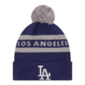Two-tone knit beanie with gray pom, striped Dodgers lettering and LA logo