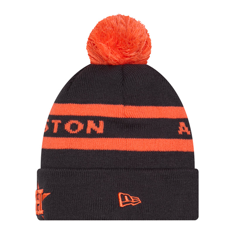 Two-tone knit beanie in dark navy with orange stripes, orange pom, team logo patch