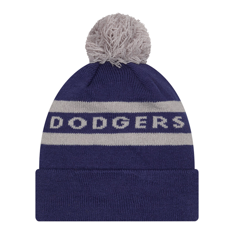 Two-tone knit beanie with gray pom and Dodgers wordmark on striped band