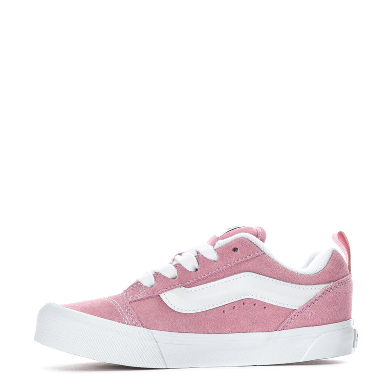 Pink kids low-top sneaker, side view with white sole and lace eyelets