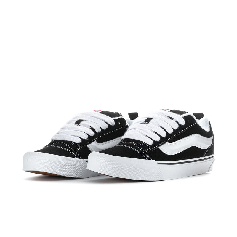 Men's Knu Skool sneakers, black uppers with white laces and white midsoles.