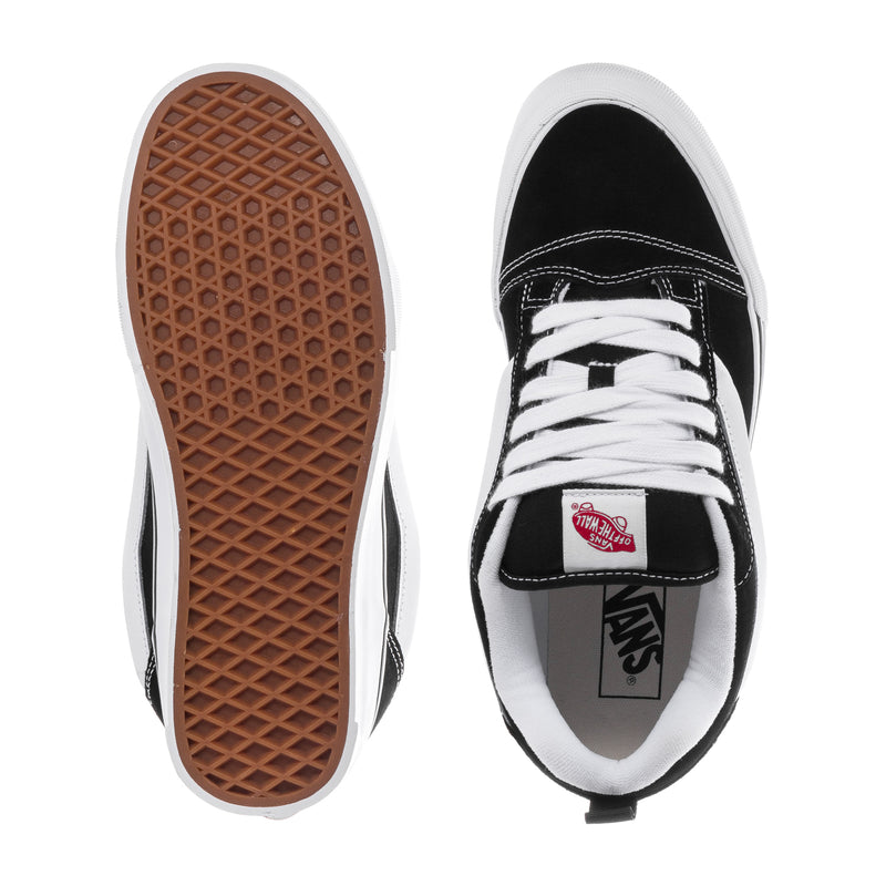 Men's Knu Skool sneakers, gum outsoles and black-and-white lace-up toe view.