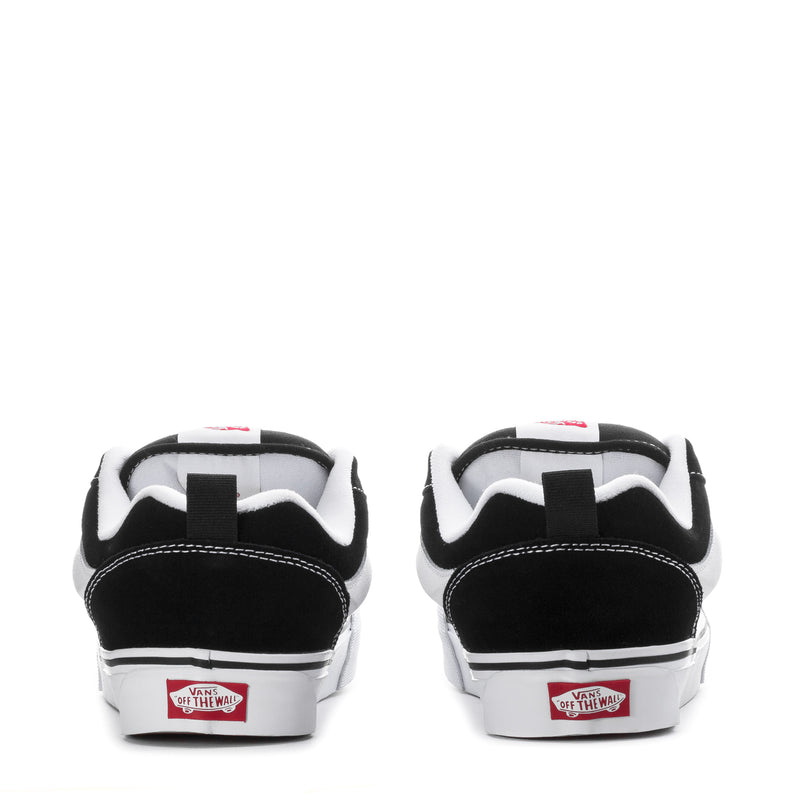 Men's Knu Skool sneakers, black heel counters with white midsoles and red labels.