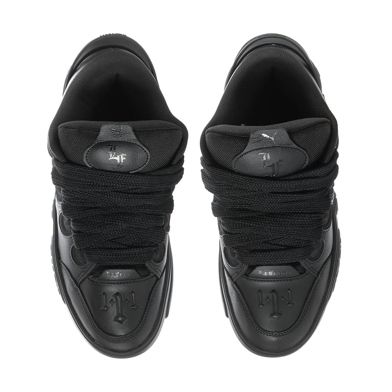 Black lace-up sneakers with cushioned collar and heel logo marks