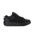 Black men's low-top skate shoe with lace-up front and textured PUMA logo details