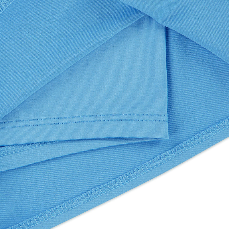 Blue athletic shorts detail with stitched seams and layered waistband