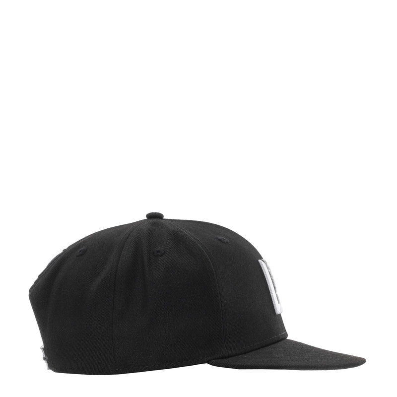 Black baseball cap with small white side logo patch