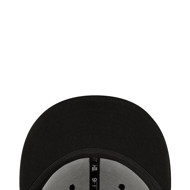 Black baseball cap interior with gray sweatband and brand patch