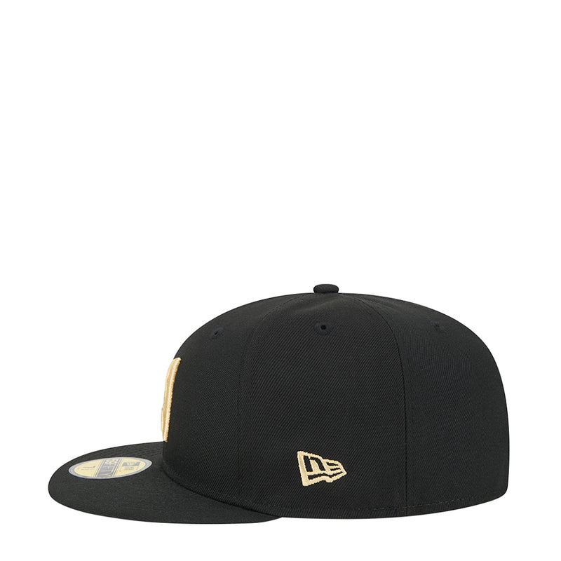 Black baseball cap with gold New Era logo on the front panel