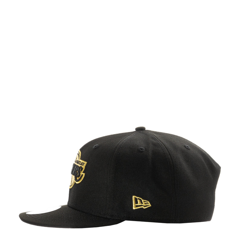 Black baseball cap with gold Lakers logo and New Era flag patch on side