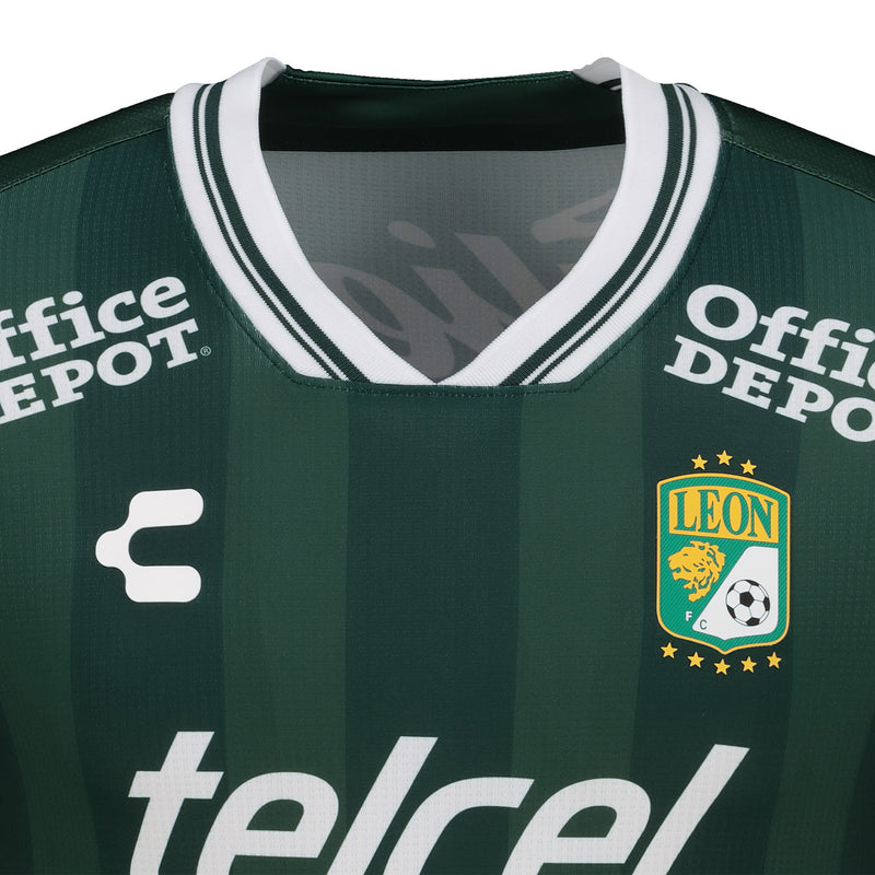 Dark green men’s soccer jersey close-up with Office Depot sleeves, telcel print, and crest