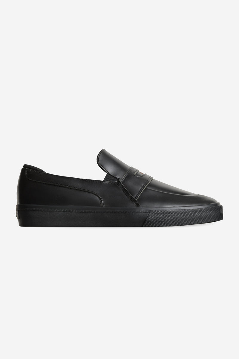 Liaizon black leather loafer with contrast stitching and a chunky black sole