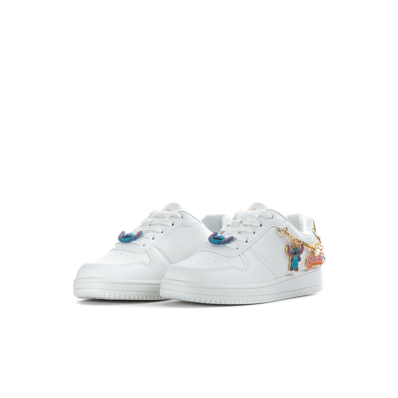 Kids white court sneaker pair with blue lace accents, Stitch charms, and gold heel tab