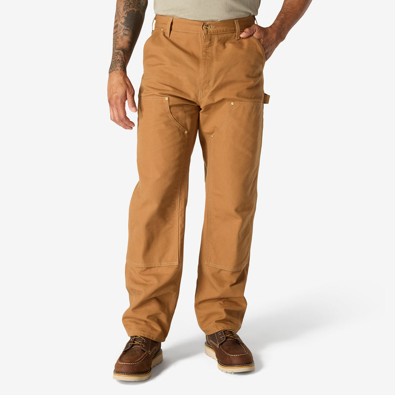 Men's brown straight-leg dungaree pants with bib-style front pockets and button details