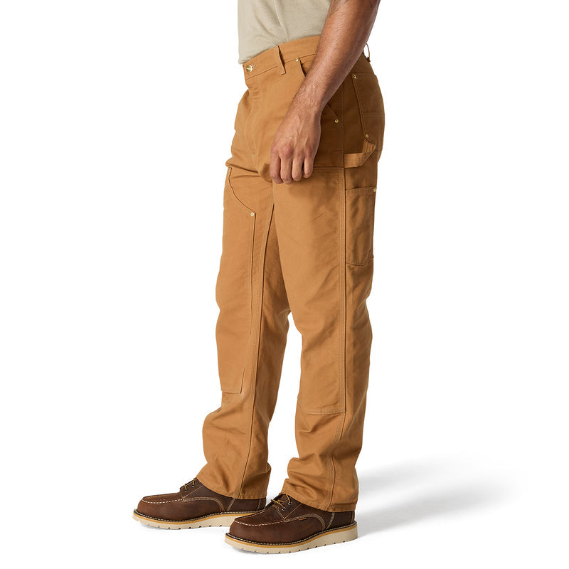 Men's brown dungaree pants detail view with side pockets and buttoned legs hems