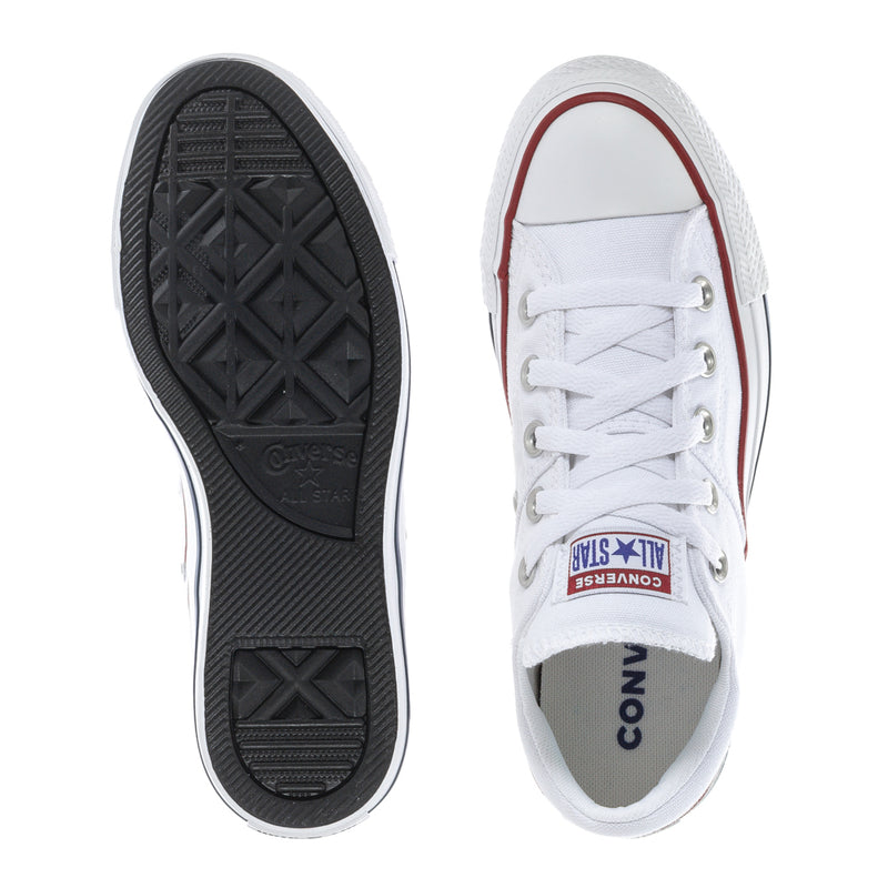 White low-top Converse sneakers showing outsole tread and heel area