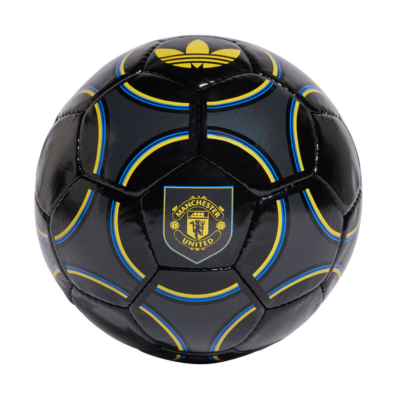 Manchester United football with black panels, blue and yellow trim, and club crest