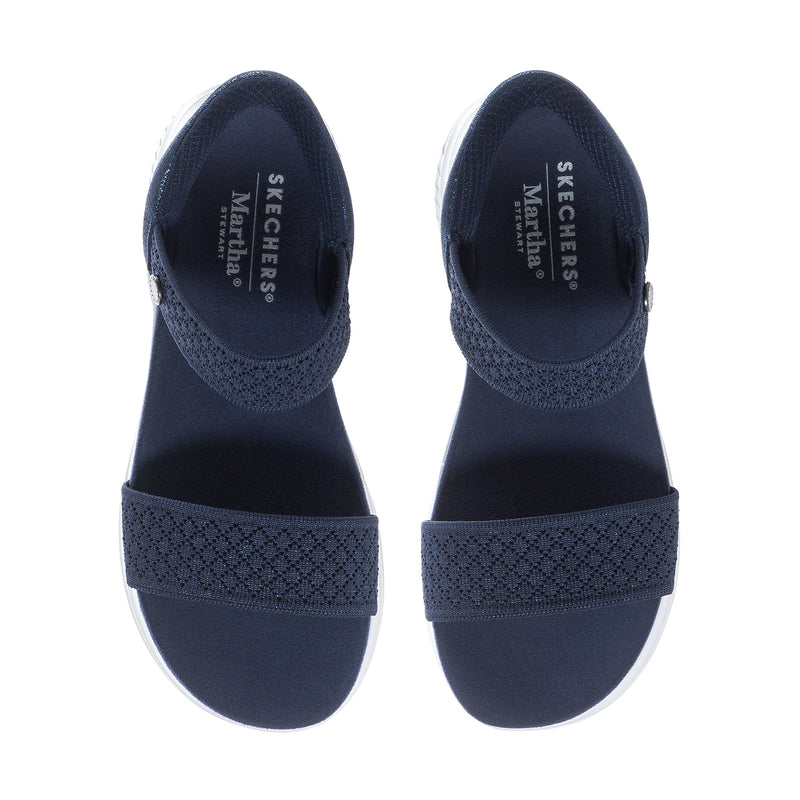 Navy slip-in sandals with open heel and padded interior