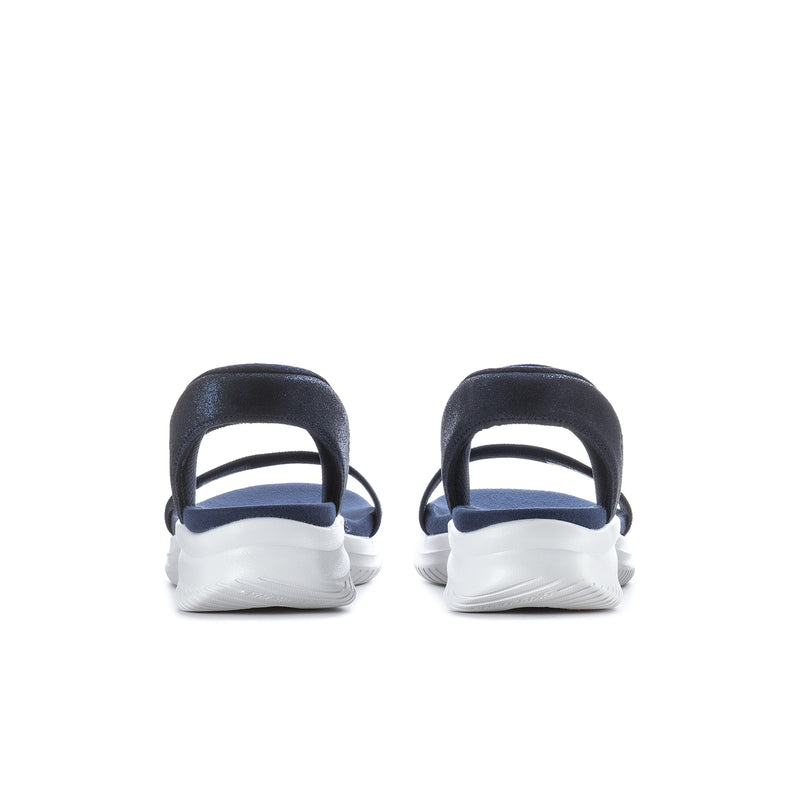 Navy back view slip-on sandals with adjustable heel strap and white sole