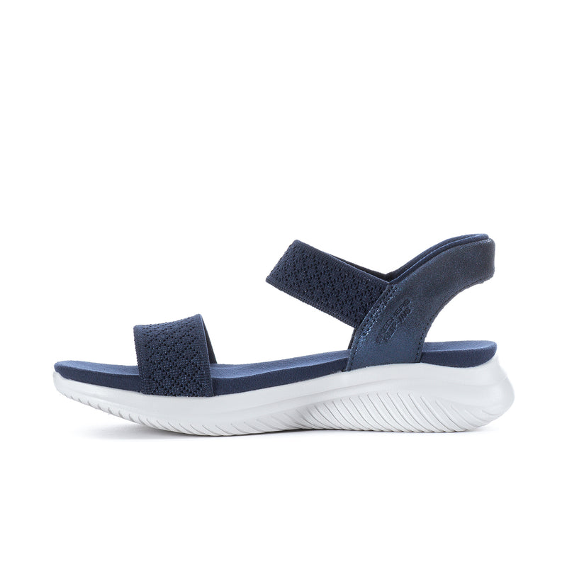 Navy slip-on sandals with textured straps and white cushioned platform sole