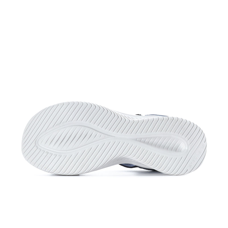 White traction outsole with ridged tread on navy slip-on sandal