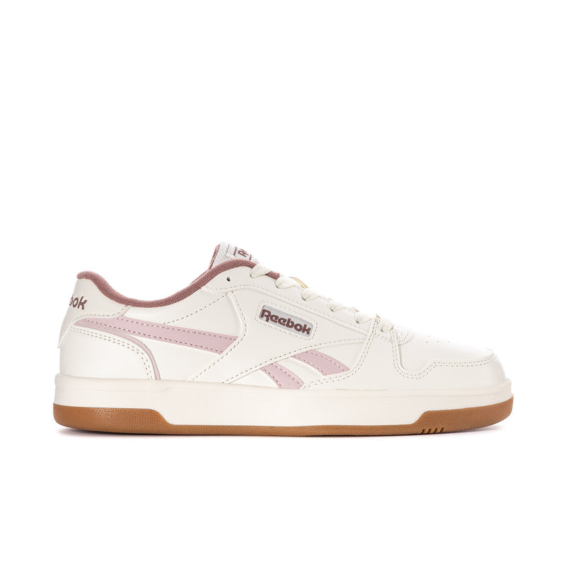 Women’s Reebok Match Prime V2 sneakers, white with pink accents and tan gum sole.