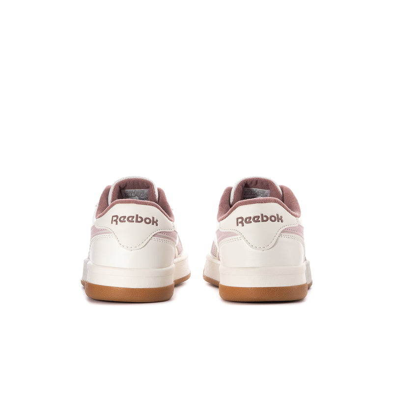 Women’s Reebok Match Prime V2 sneakers, white with pink heel tab and tan outsole.