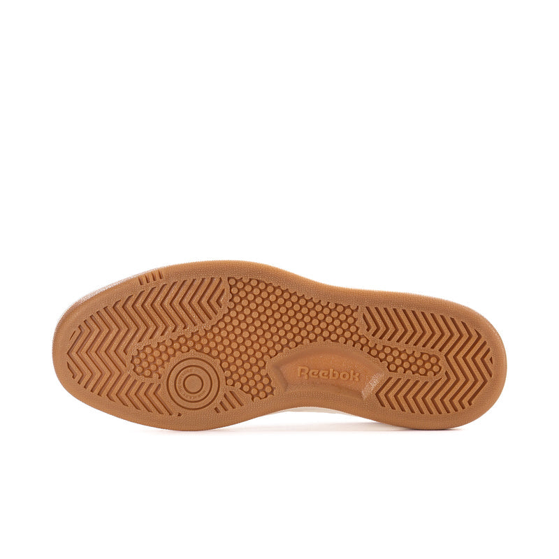 Women’s Reebok Match Prime V2 gum outsole with textured tread in tan/brown.