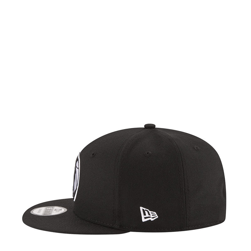 Black baseball cap with white Mavericks logo and New Era flag patch