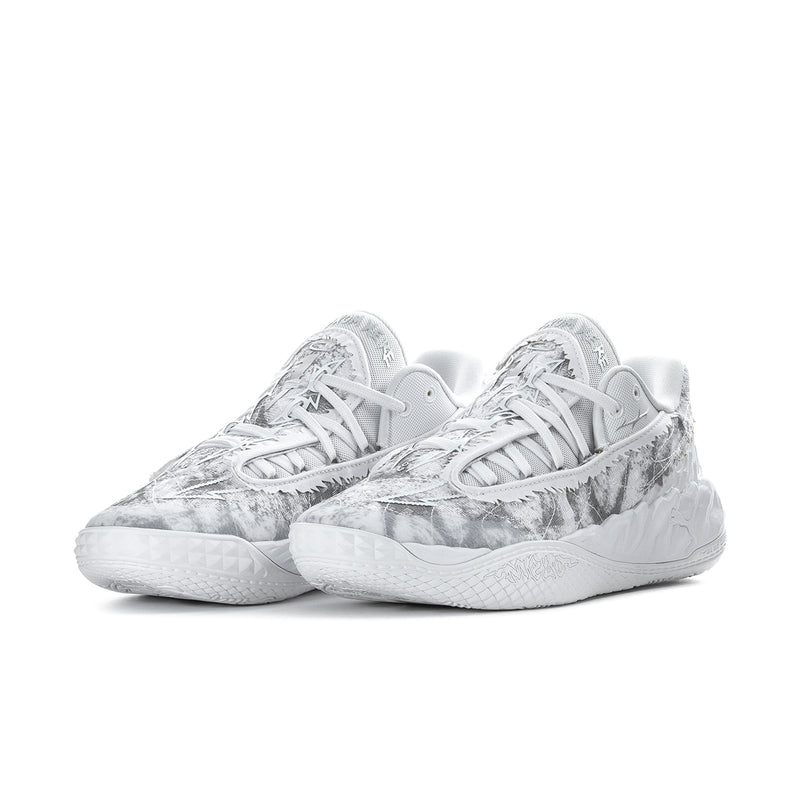 Men's low-top sneakers, lace-up with gray speckled camo print and white rubber sole.