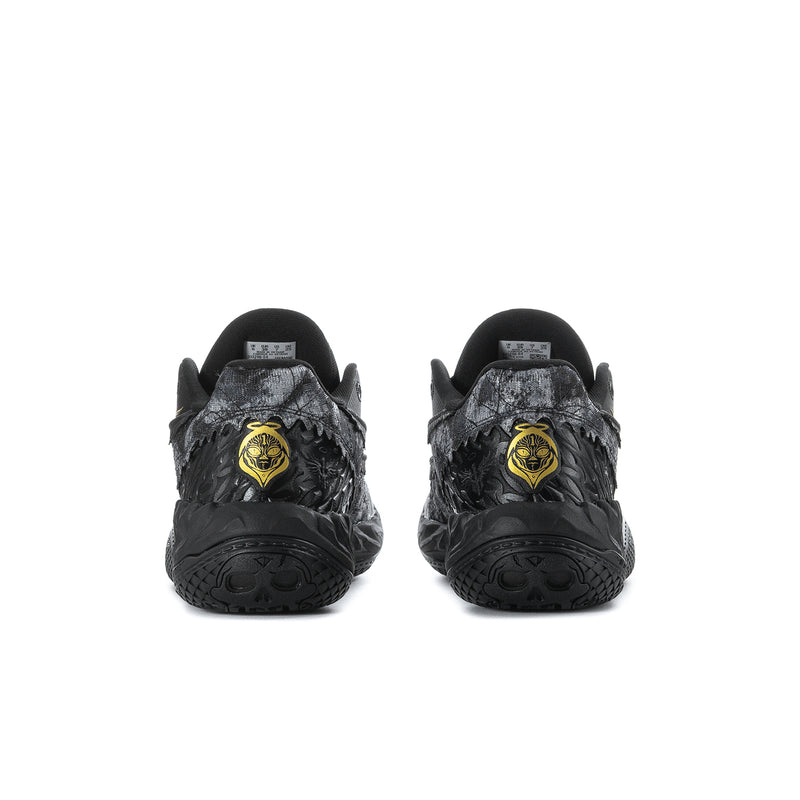 Men's sneakers rear view with gold emblem on heel, dark gray/black upper