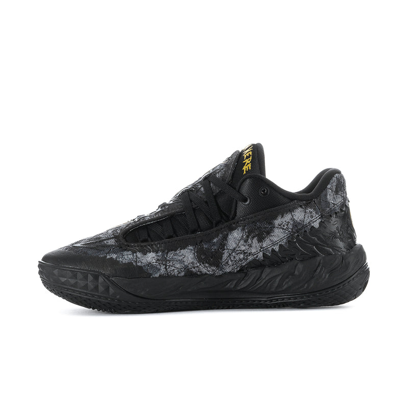 Men's low-top sneakers side profile with textured dark upper and yellow Puma logo
