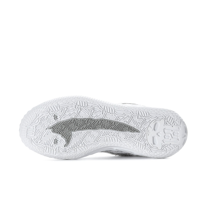 Outsole of men's low-top sneakers with patterned traction tread on white rubber.