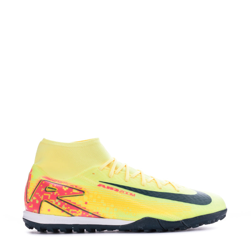 Men's turf soccer cleats, light yellow with red graphic sides and black sole