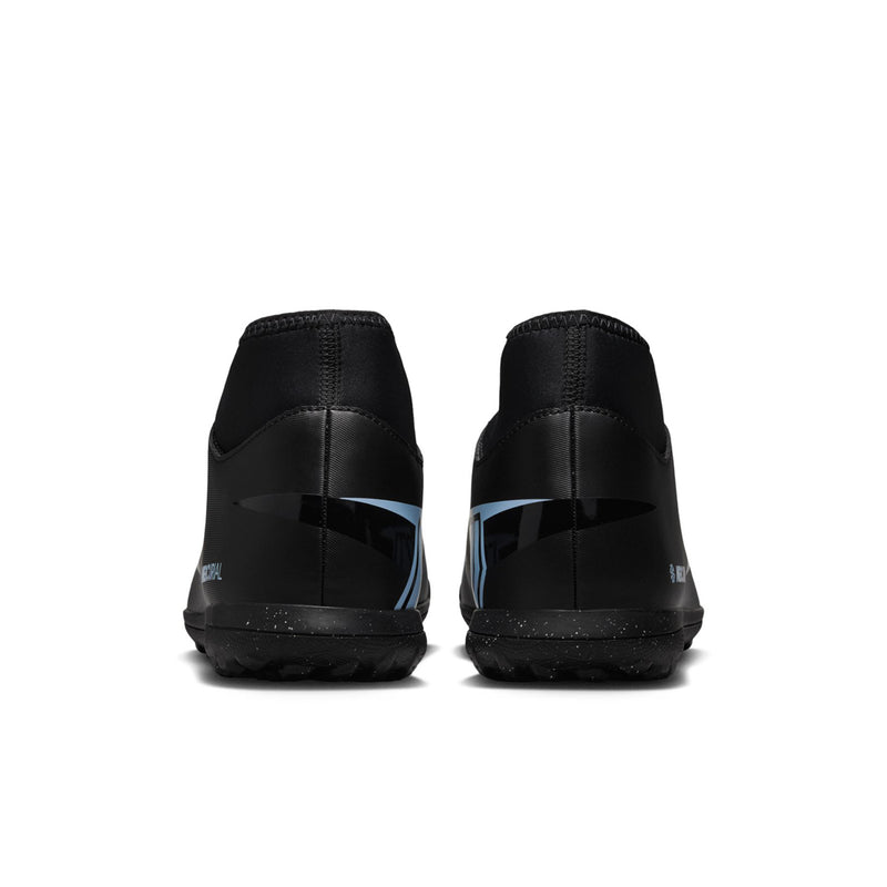 Back view pair of men's black turf cleats with ice blue heel stripe and tread