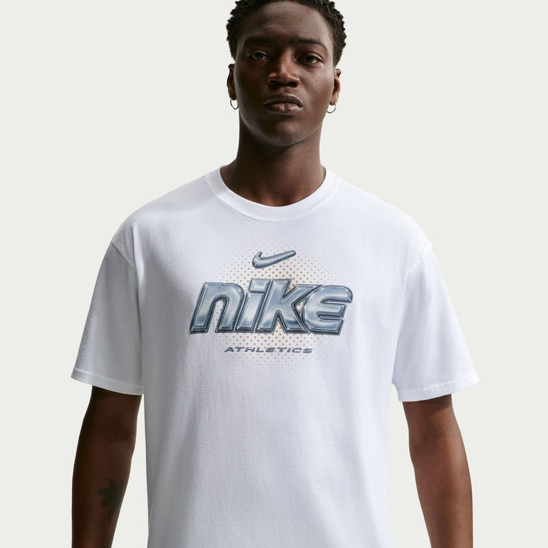 White short-sleeve tee with metallic Nike Athletics logo across chest