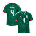 Youth green home jersey with E. Alvarez name, number 4, red and white trim
