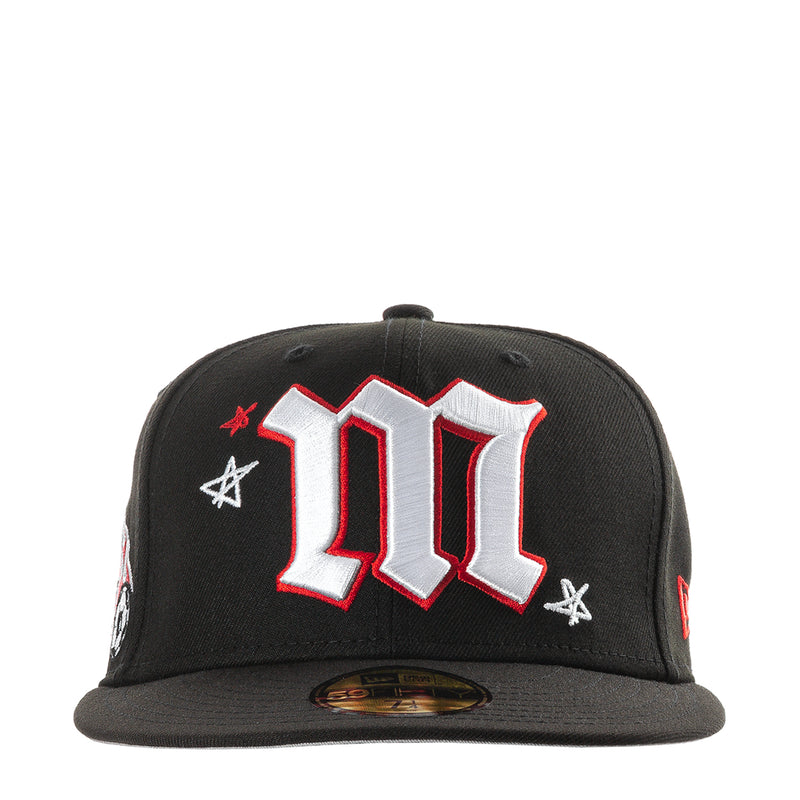 Black baseball cap with large white Mexico "M" side patch and red flame accents