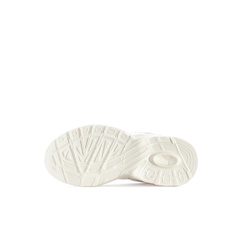Kids' sneaker outsole with traction tread on off-white rubber base