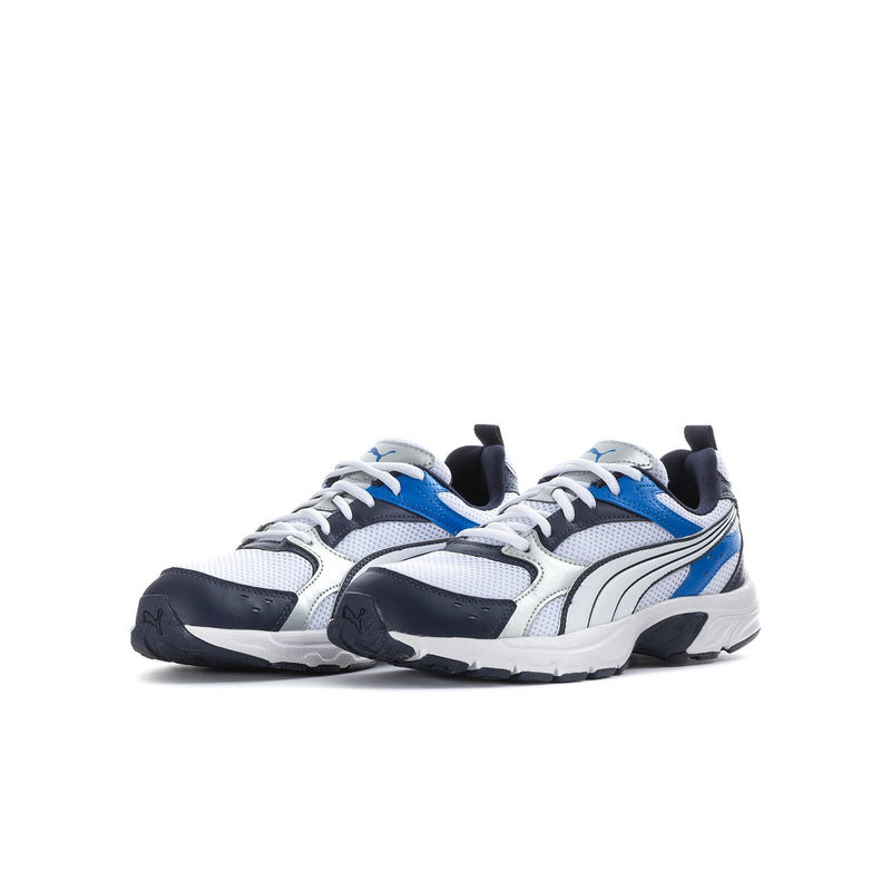 Youth sneakers, three-quarter view, white upper with blue accents and black heel