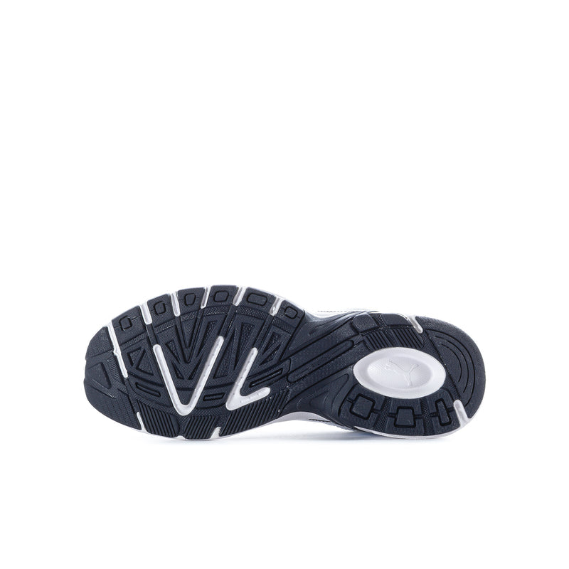 Youth sneaker outsole view with dark traction tread and white cushioning insert