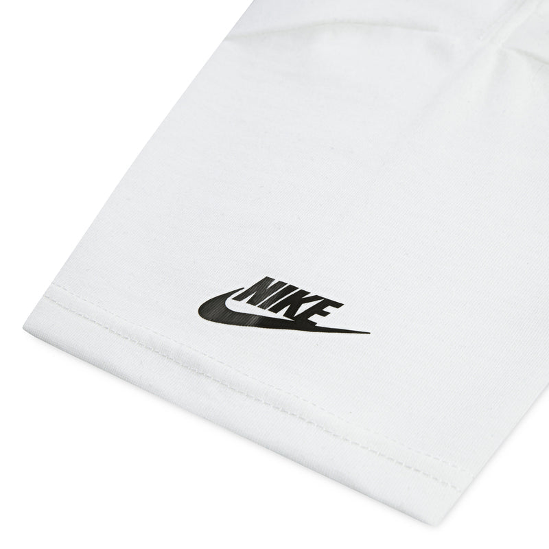 Youth white T-shirt with black Nike swoosh on lower hem