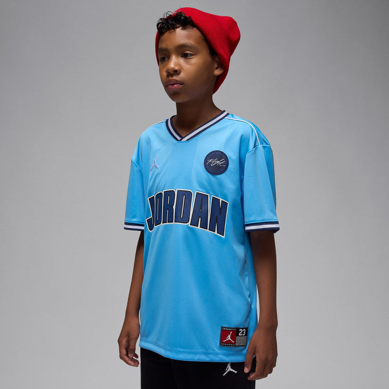 Youth light blue basketball jersey, JORDAN wordmark and patch with Jumpman icon