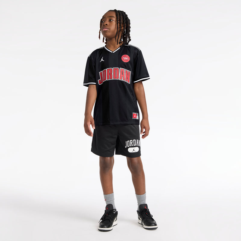 Black youth basketball jersey and matching shorts set with Jordan logos